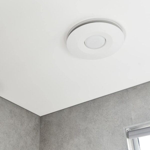 close up view of bathroom fan with round led light